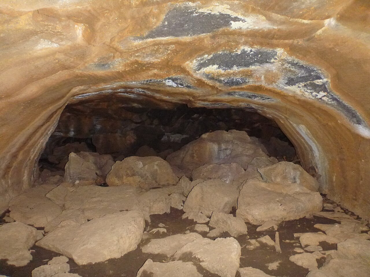Dark lava tube passage in the Mammoth Cave lava tube field near Bower Cave, Dixie National Forest