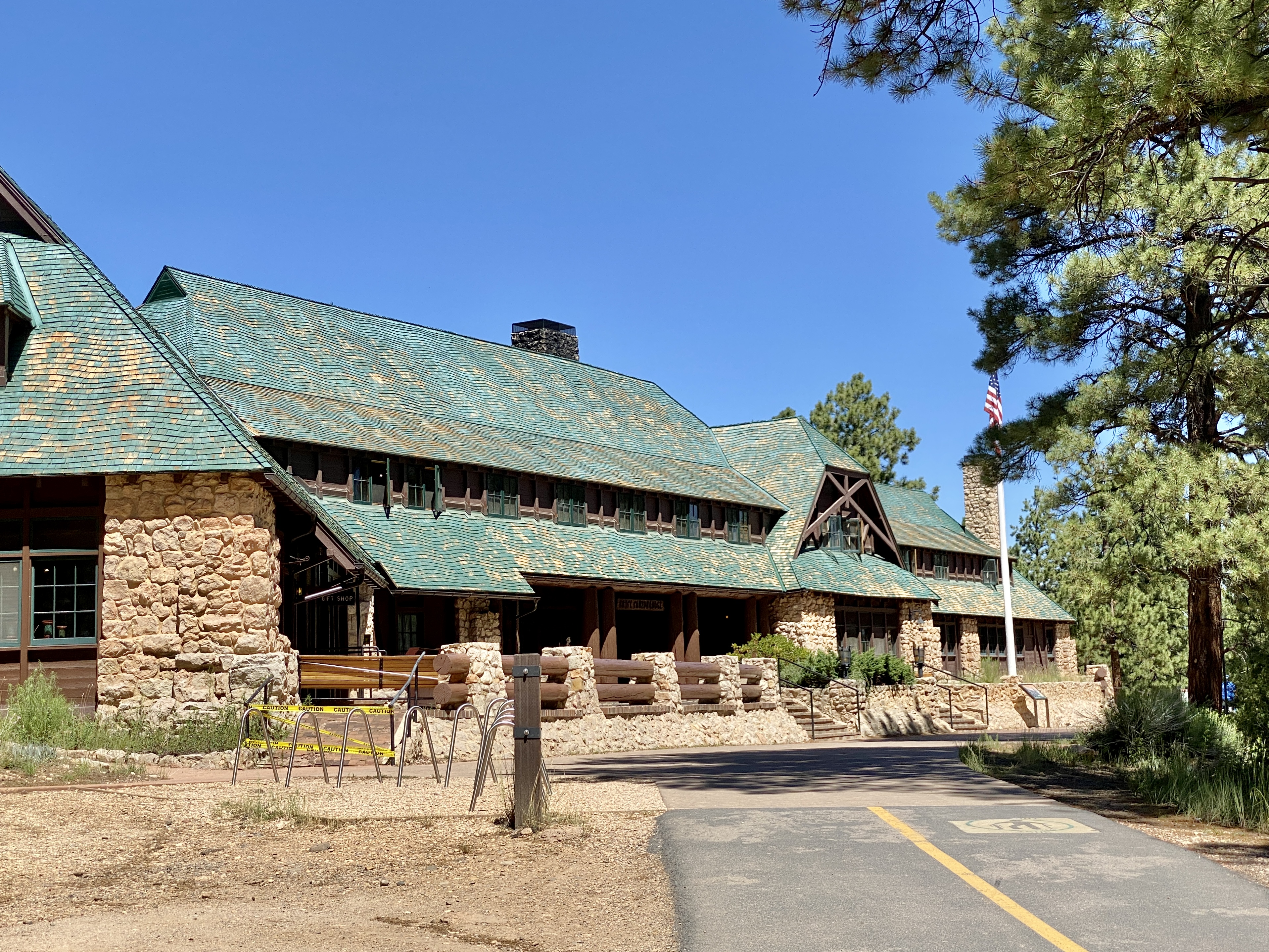 Stone-and-timber facade of the historic Lodge at Bryce Canyon under ponderosa pines