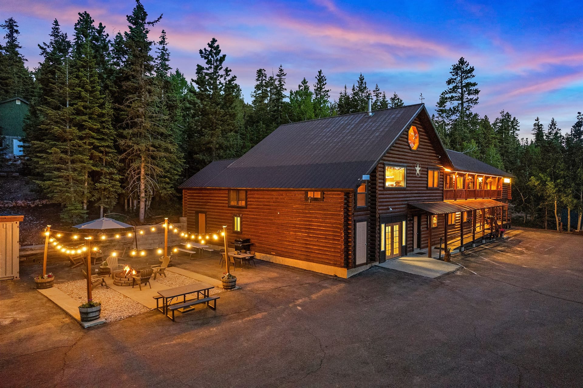 Duck Creek Village Inn exterior at dusk