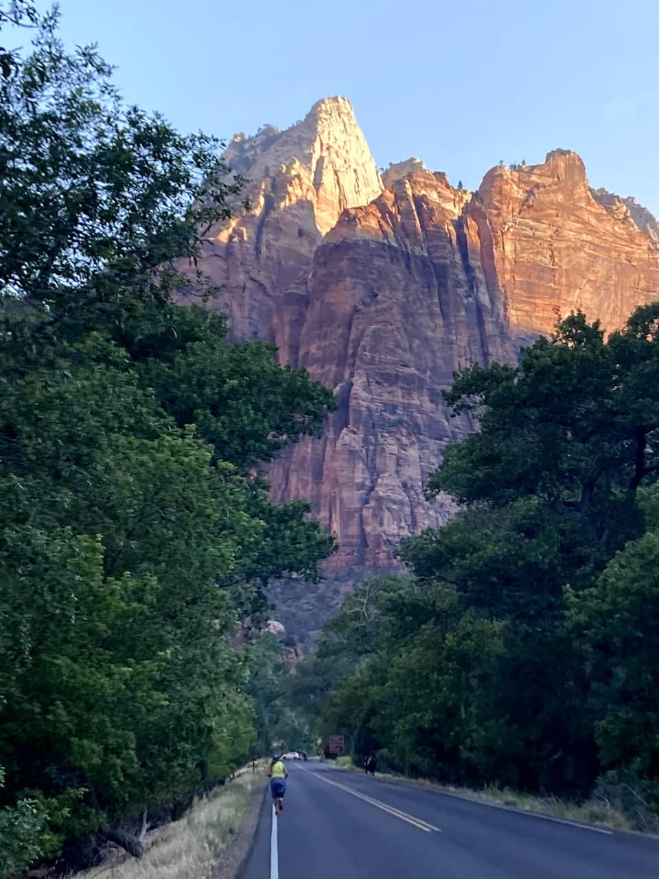 First light on the sandstone walls above the Zion Canyon Scenic Drive, photographed by the innkeepers
