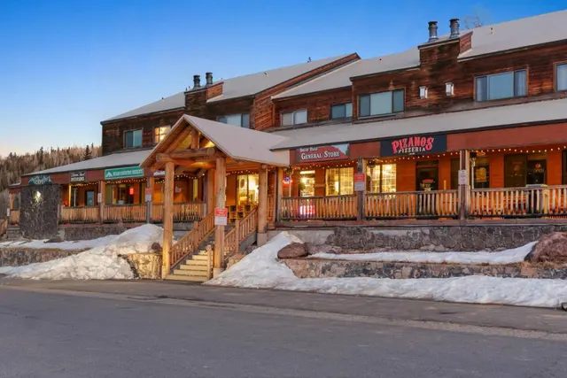 Row of shops with a general store and pizza restaurant at the Brian Head base