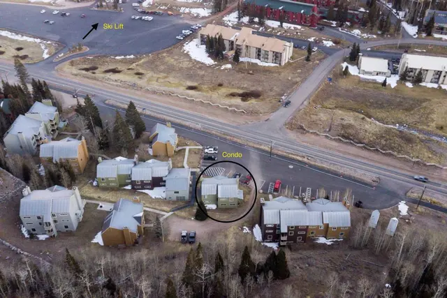 Aerial photo with the condo circled and Highway 143 and the Giant Steps base area just across the road